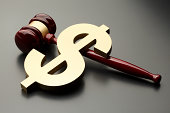 A dollar symbol on a gavel.Please see some similar pictures from my portfolio: